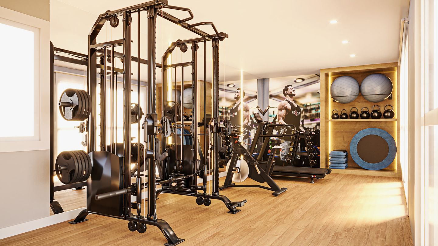 Academia do condomínio com equipamentos de musculação e cardio