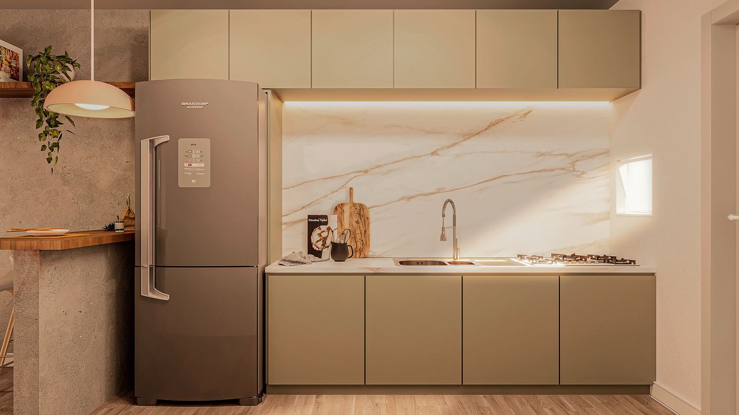 Cozinha planejada com cooktop, bancada em porcelanato e armários